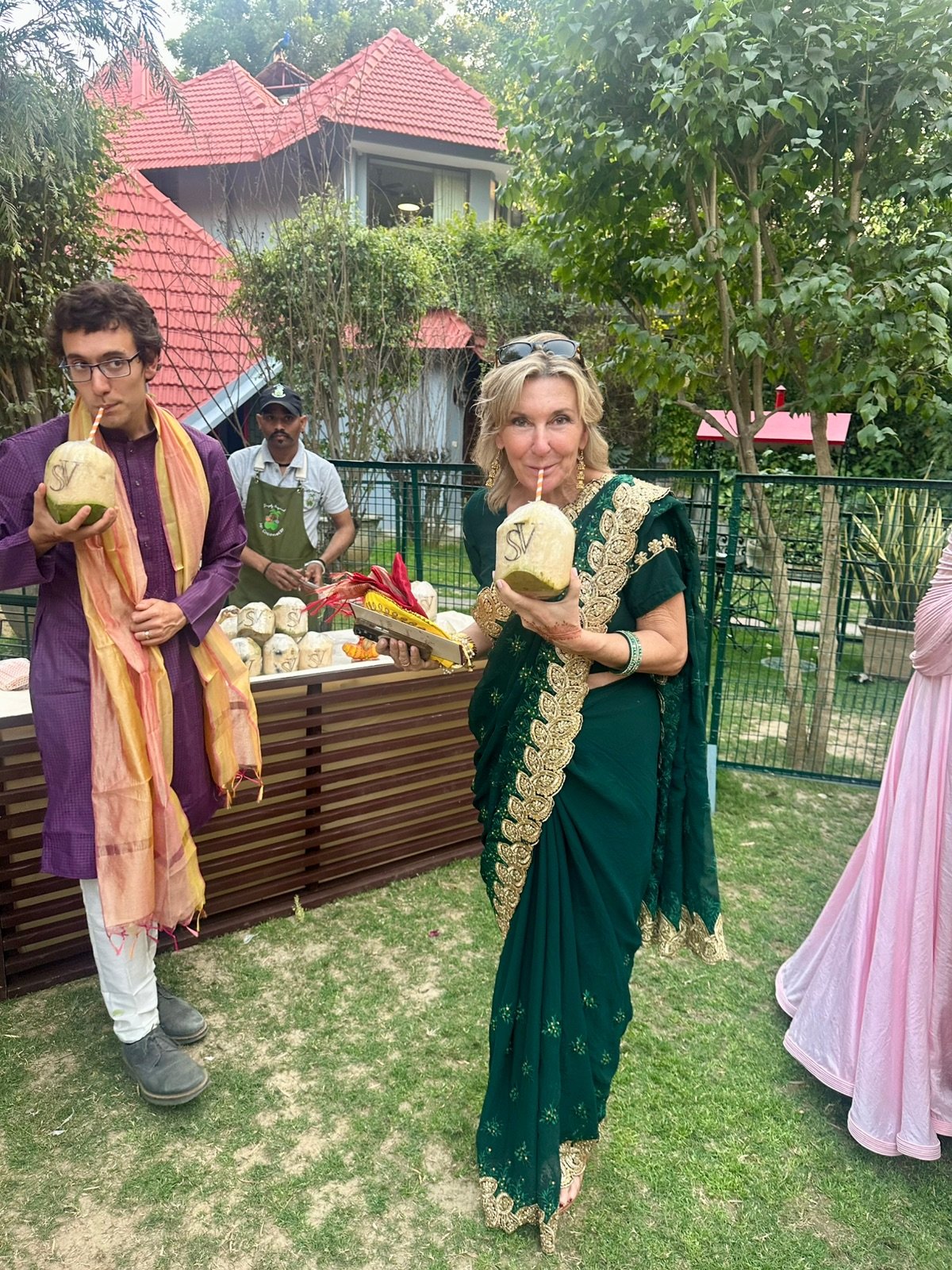 Guests enjoying customized coconuts at an event