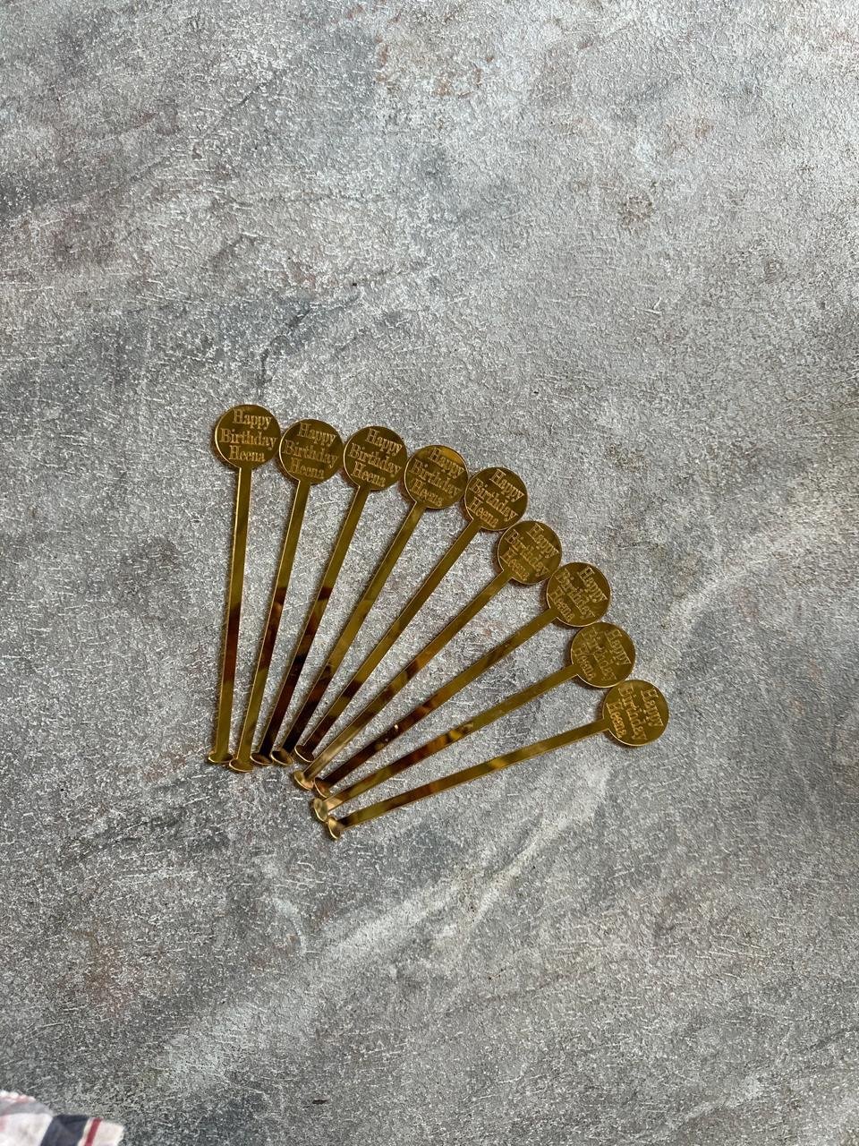 Gold birthday drink stirrers